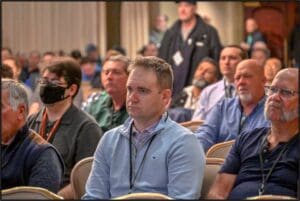 The Paving Conference audience listens carefully